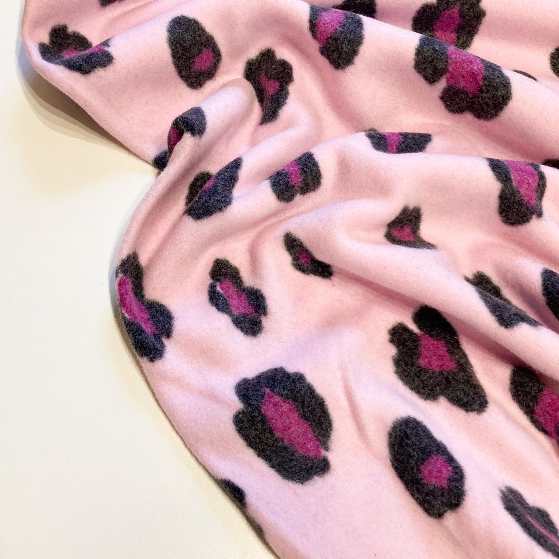 Organic Cotton Fleece with Snow Leopard Print in Pink – Catkin